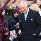 King Charles III and Camilla, Queen Consort meet members of the public during a visit to the Bangladeshi community of Brick Lane on February 8, 2023 in London, England. 