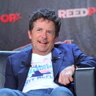 Actors Michael J. Fox speaks during a "Back To The Future Reunion" panel at New York Comic Con on October 08, 2022 in New York City.