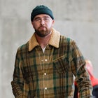 KANSAS CITY, MISSOURI - DECEMBER 10: Travis Kelce #87 of the Kansas City Chiefs arrives before the game against the Buffalo Bills at GEHA Field at Arrowhead Stadium on December 10, 2023 in Kansas City, Missouri.
