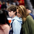 Alicia Silverstone and Bear Blue at a Los Angeles Clippers game in November 2023