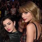 Charli XCX and Taylor Swift pose backstage at iHeartRadio Jingle Ball 2014