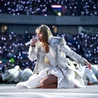 Taylor Swift performing on stage in Edinburgh, Scotland