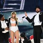 Taylor Swift is joined on stage by Travis Kelce (R), during "Taylor Swift | The Eras Tour" at Wembley Stadium on June 22, 2024 in London, England