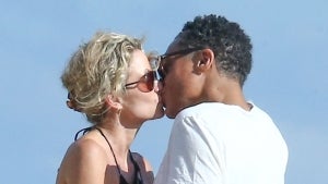 Amy Robach and T.J. Holmes 'Going Strong' as They Kiss in Miami! (Source)