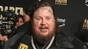 Watch Jelly Roll Bring the Party to 2023 ACM Awards Red Carpet (Exclusive) 