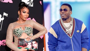 Watch Nelly React to Ashanti's Purse With Throwback Photo of Them Together (Exclusive)