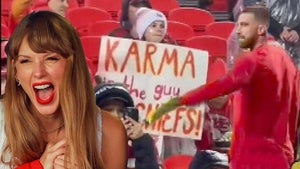 Watch Travis Kelce React to Taylor Swift-Inspired Sign at Chiefs vs. Eagles Game