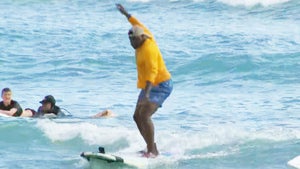 ‘Magnum P.I.’s Stephen Hill Shows Off His Surfing Skills With the Waikiki Beach Boys