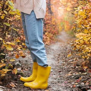 woman wearing rain boots
