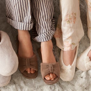 girls wearing slippers
