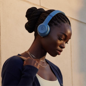 Woman wearing Beats Solo 4 headphones