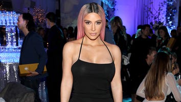 Kim Kardashian Sports Sexy Little Black Dress at Music Release Party