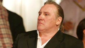Actor Gerard Depardieu Pees in Airplane Cabin