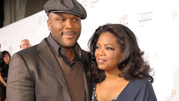 Oprah Strains Back Lifting Gift from Tyler Perry