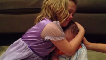 Little Girl Cries Over Baby Brother