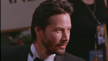 Keanu Reeves Finds Female Intruder Sitting In His Library