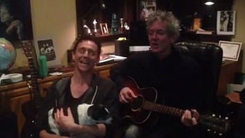 Watch Tom Hiddleston Sing a Christmas Carol With a Puppy in His Lap