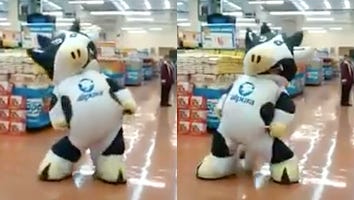 No One Loves Their Job More Than This Guy in a Cow Costume Dancing in a Supermarket