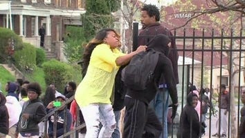 This Baltimore Mom Is Being Congratulated for Pulling Her Son Out of the Riots