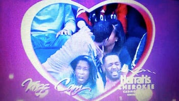 Happy Couple + Full Cup of Beer = The Epic Kiss Cam Fail You've Been Waiting For!
