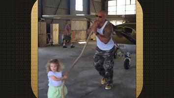 Watch Dwayne 'The Rock' Johnson Adorably Trick a 2-Year-Old Into Thinking She's Pulling an Airplane