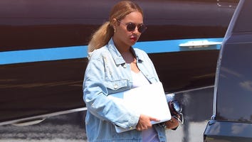 Beyonce Sparks More Pregnancy Rumors as She Covers Her Stomach in Flowy Dress