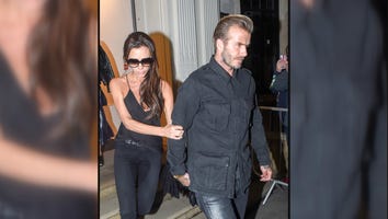 Victoria Beckham Nearly Falls Over As She Leaves Party Clinging to David Beckham
