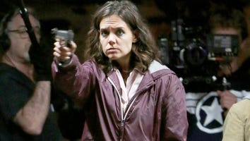 Katie Holmes Points a Gun On Set, Looks Unrecognizable
