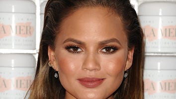 Chrissy Teigen Reveals Her Tiny Baby Bump in New Bathroom Selfie!