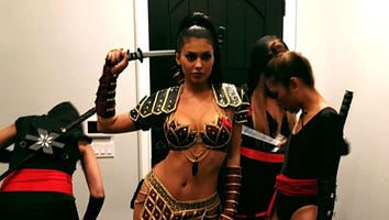 Kylie Jenner Flaunts Major Cleavage and Toned Abs in Sexy Warrior Costume!