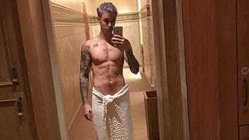 Justin Bieber Shows Off New Purple Hair and Insane Abs in Series of Nearly Naked Selfies