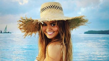 Pregnant Chrissy Teigen Strips Down to a Barely-There Bikini For Sports Illustrated Swimsuit Issue