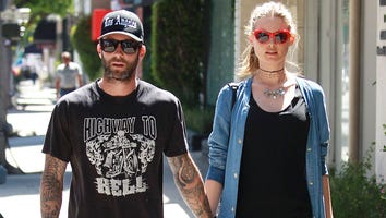 Behati Prinsloo Stylishly Hides Baby Bump While Shopping With Husband Adam Levine