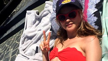 Behati Prinsloo Shows Off Her Baby Bump in a Bikini -- See the Pic!