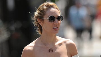 Candice Swanepoel Shows Off Baby Bump in Cute Crop Top