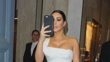 Kim Kardashian Exposes Spanx in Super High-Slit Dress at the Opera of Rome