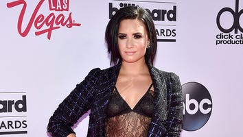 EXCLUSIVE: Demi Lovato Teases New Tour, Rocks Sexy Sheer Top at Billboard Music Awards