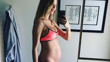 Behati Prinsloo Bares Her Baby Bump in Hot Pink Bikini