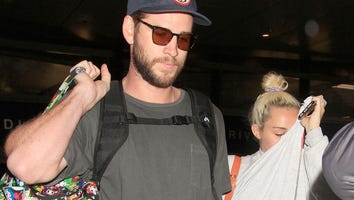 Miley Cyrus and Liam Hemsworth Finally Show PDA - See The Photo!