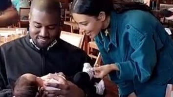 Kim Kardashian and Kanye West Adorably Cradle Chrissy Teigen and John Legend's Daughter Luna
