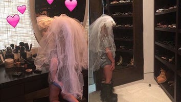 Kourtney Kardashian's Daughter Penelope Wears Bridal Veil, Sky-High Stiletto Boots