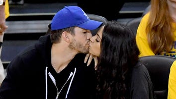 Mila Kunis and Ashton Kutcher's Courtside Kiss -- See the Pics!