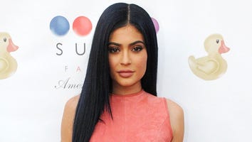 Kylie Jenner Shows Her Bare Butt and Curves in Ripped Denim Shorts, Gets Roses From French Montana