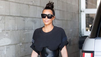 Kim Kardashian Steps Out in Strange T-Shirt-Corset Combo After Taylor Swift Fallout