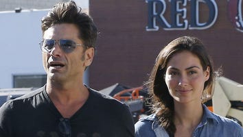 John Stamos and Girlfriend Caitlin McHugh Take a PDA-Filled Stroll in West Hollywood
