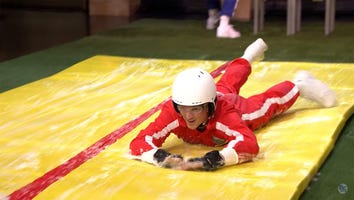 Miles Teller and Jimmy Fallon Ride Slip-N-Slides to Play Flip Cup