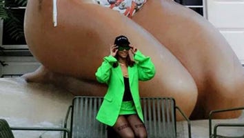 Rihanna Poses With Huge Bikini-Clad Statue of Herself: 'Went to Visit My Boobs'