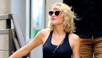 Taylor Swift Gives a Coy Smile in First Pic Since Tom Hiddleston Split News