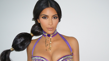 Kim Kardashian Stuns in Purple Belly-Dancing Costume
