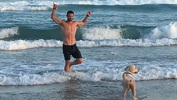 Chris Hemsworth Shows Off Incredible Abs While Swimming in the Ocean